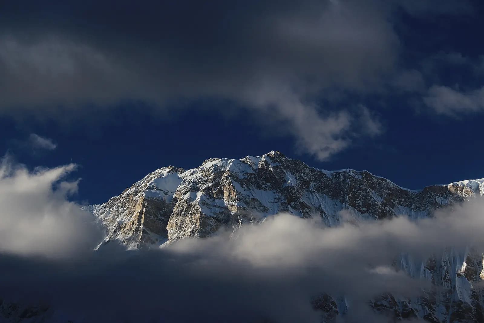Clouds clearing from the snow peaks above Annapurna Base Camp